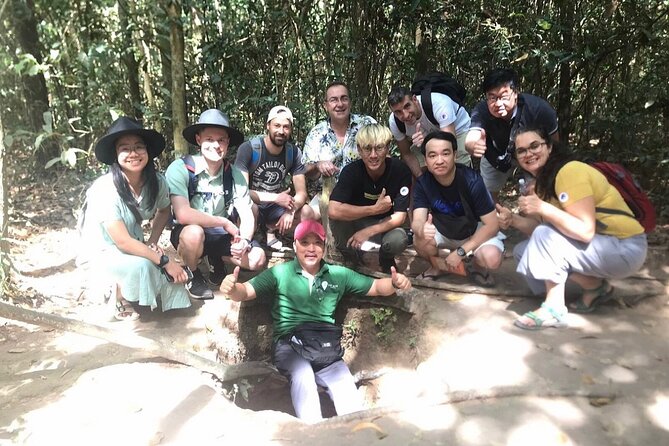 6 Hours Historical Tour in Cu Chi Tunnel with Free Snack - Entering the tunnel world: entrances, size, and the secret-door idea