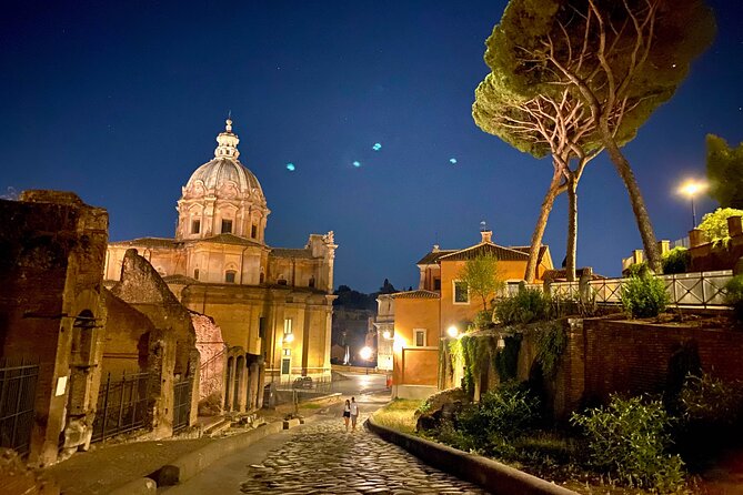 Ancient Rome at Dusk: Guided Walking Tour - Piazza del Colosseo meeting point and the small-group format