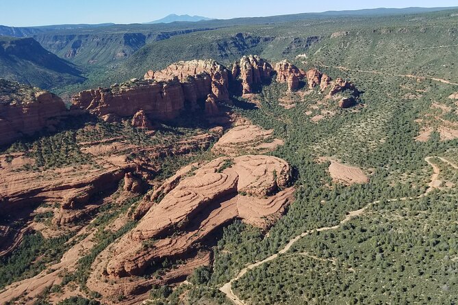Ancient Sedona (30+ Mile) - Sedona Helicopter Tour - Natural bridges, golf-course flybys, and the 3-fingers moment