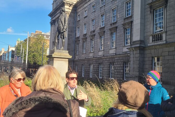 Book of Kells. Medieval Dublin Castle. 5</em> History & Heritage Tour – College Green and the Bank of Ireland building: parliament stories in plain sight’ /><br />
After Trinity, you head to College Green for a stop outside the Bank of Ireland building. This is one of those places that looks like it belongs to one story—then you learn it used to belong to another.</p>
<p><p>You’ll stand on the traffic island on College Green and look up at a grand façade with a royal coat of arms, statues of Hibernia (the Latin name for Ireland), and figures representing Fidelity and Commerce. There are also cannons at ground level and a sentry box.</p>
</p>
<p><p>So what was it before it became a bank? For the first 61 years of its life, it was home to the Irish Houses of Parliament. Then, in 1800, the Irish parliament voted itself out of existence. By 1803, the building became the Bank of Ireland’s flagship branch.</p>
</p>
<p><p>Even better, the building was the first purpose-built bicameral houses of parliament in Europe. Bicameral means it had two chambers: a House of Commons and a House of Lords. That single detail helps you understand the whole political structure behind the stone you’re standing in front of.</p>
</p>
<p><p>This stop is only about 10 minutes, and it’s free to enter, but it gives you something bigger than a photo. You walk away with a mental map of how Dublin’s civic power shifted over time.</p>
</p>
<h2 id="molly-malone-statue-a-quick-photo-stop-with-lasting-cultural-memory">Molly Malone statue: a quick photo stop with lasting cultural memory</h2>
<p><img width="669" height="446" decoding="async" src=