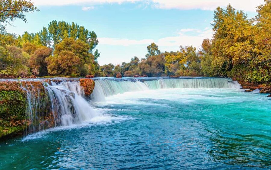 City of Side: Green Canyon, Waterfall, Ancient City Mix Tour - Transport realities: older buses, cold weather, and comfort