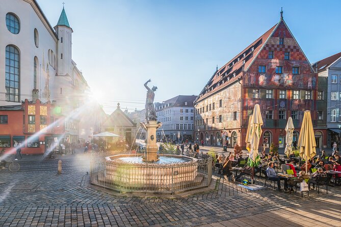 Classic city tour in the World Heritage City of Augsburg - Augustusbrunnen on Rathausplatz: a fountain stop with a job