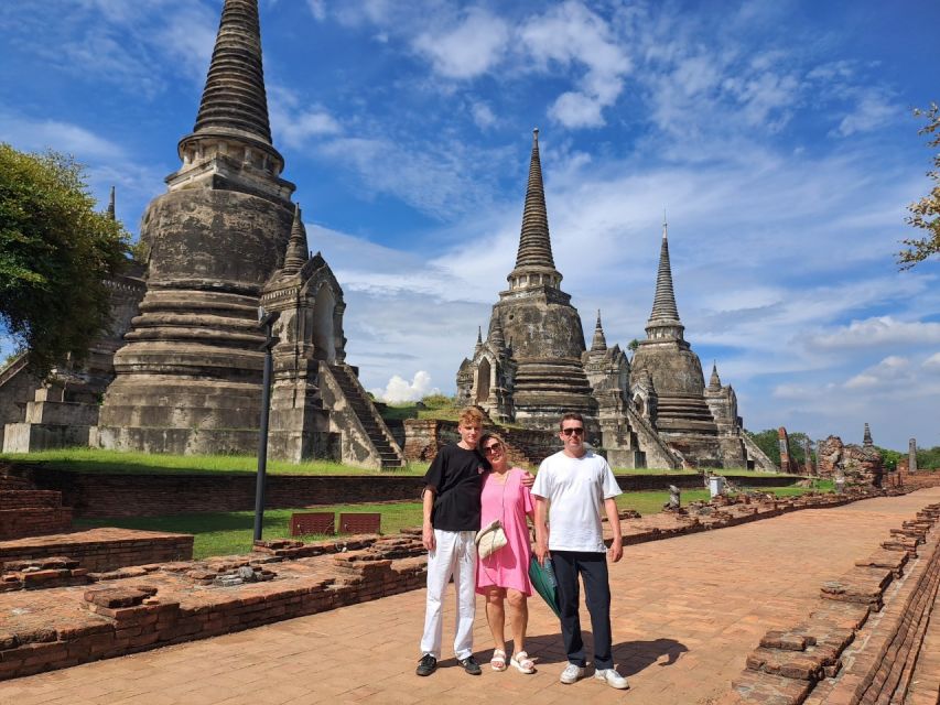 Colors of Ayutthaya: UNESCO Heritage 6 hour Bicycle Tour - Wat Mahathat: The Buddha Head in Tree Roots