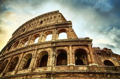 Colosseum and Ancient Rome Guided Tour - Entering the Colosseum: engineering, power, and the audience