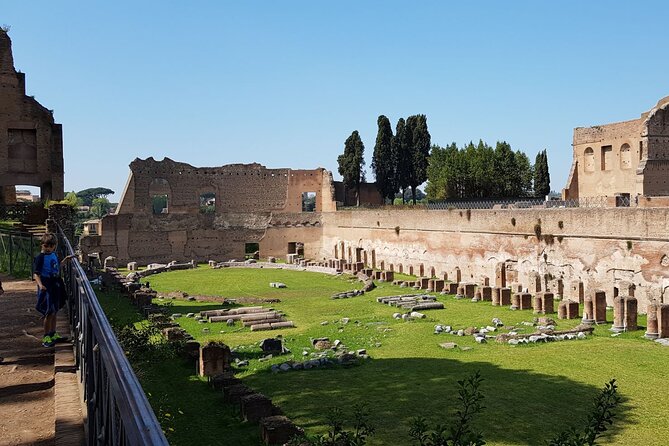 Colosseum Arena Floor and Ancient Rome Semi Private Guided Tour - Roman Forum walk: broken columns, Senate House passes, and Arch of Titus
