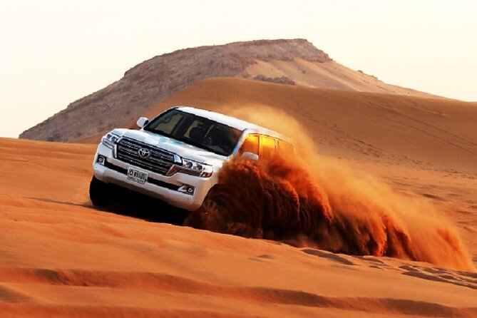 Dubai Evening Desert Safari With BBQ Dinner at Arabian Heritage - Pickup in a Nissan Patrol or Land Cruiser (and why it matters)