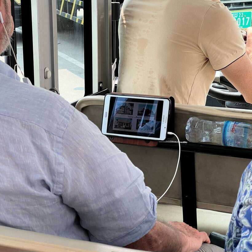 Heritage tour of Phnom Penh in electric bus - The tablet + headset system: how you get context without getting lost