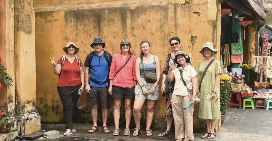 Hoi An: Ancient Town Guided Walking Tour - Meeting point reality: finding the guide with the blue paper fan