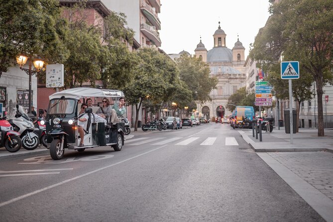 Madrid Historical Tour with Local Guide in Eco Tuk Tuk Private - Puerta de Alcalá and the banking-power skyline