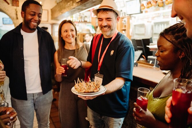 Madrid Tapas & Taverns Small Group Food & History Tour - A focused walking history: Royal Palace, Habsburg streets, Plaza Mayor, Puerta del Sol