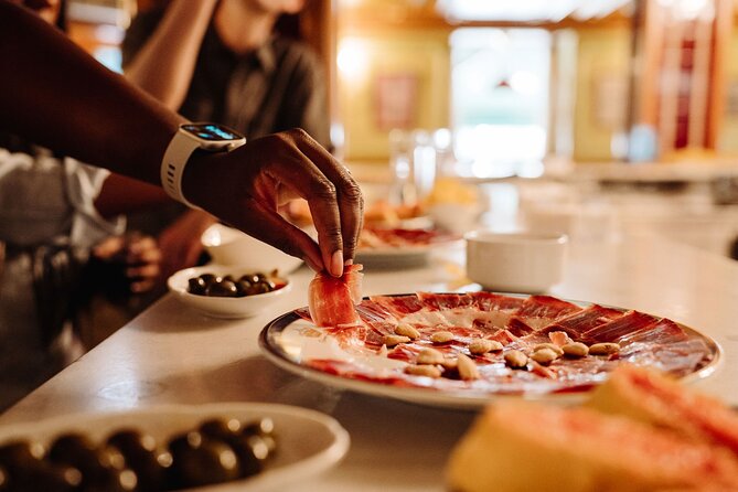 Madrid Tapas & Taverns Small Group Food & History Tour - Mesón del Champiñón: a beloved bar stop plus a local drink pairing