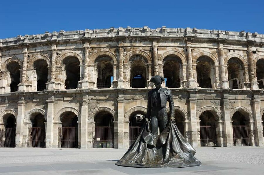 Nimes: Ancient Roman Arena Ticket & Old Town Audio Tour - Nîmes Arena in real life: what makes this Roman amphitheatre special