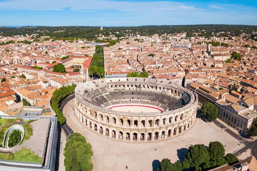 Nimes: Ancient Roman Arena Ticket & Old Town Audio Tour - Entering the arena halls: how the visit flows on your own time