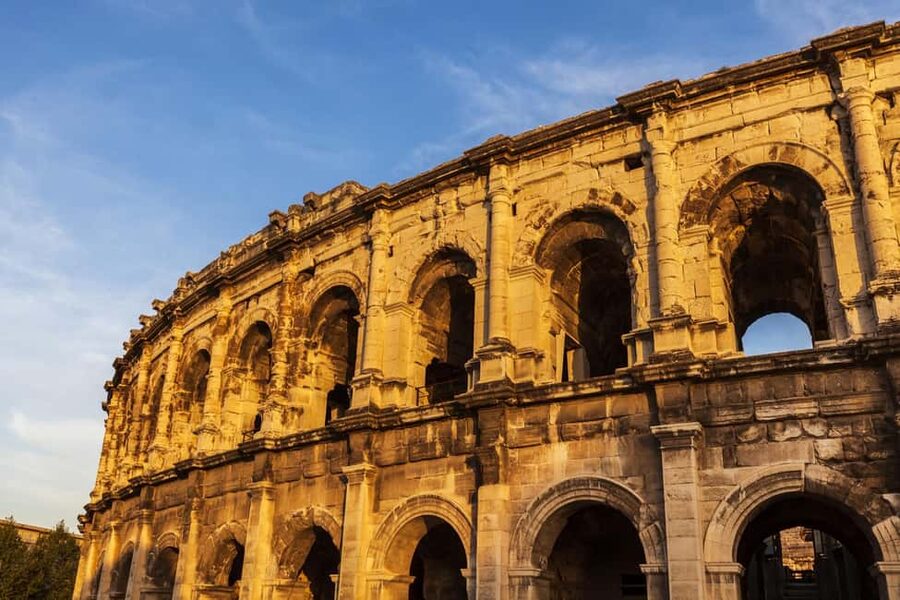 Nimes: Ancient Roman Arena Ticket & Old Town Audio Tour - Old Town audio guide app: linking the arena to Nîmes Roman highlights
