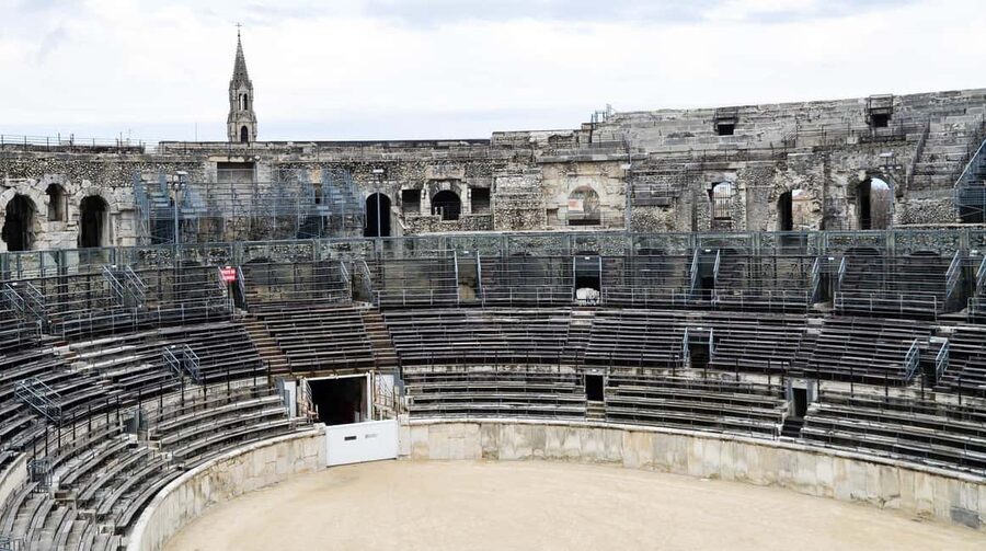 Nimes: Ancient Roman Arena Ticket & Old Town Audio Tour - Your ticket’s core value: arena access plus the audio experience