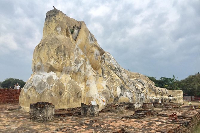 Private Excursion to Floating Market and Ayutthaya World Heritage - Ayutthaya’s historic core: Wat Mahathat and the famous stone faces