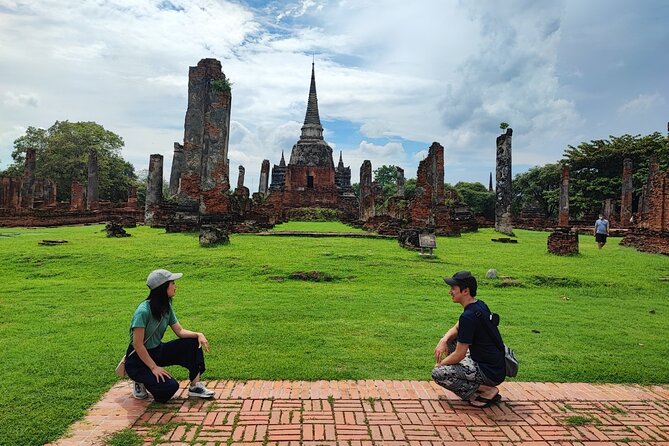 Private Tour to Ayutthaya, World Heritage Site with Boat Tour - Wat Mahathat: The Buddha Head in Bodhi Tree Roots