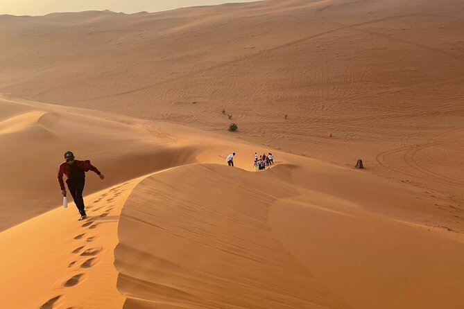 Red Sand Dunes Tour with Camel Ride ,Quad Biking, Heritage House - Choosing Your Desert Activities: Sandboarding, Archery, Volleyball, and More