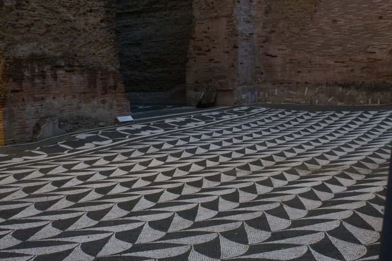 Rome: Ancient Baths of Caracalla Ticket & Audio Guide - Following the ruins: pool area, gymnasium, and massage rooms