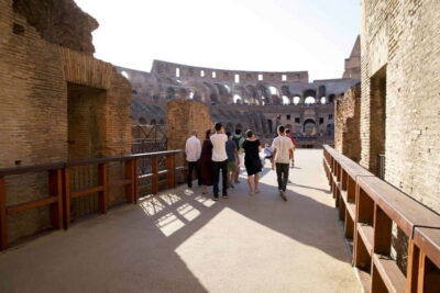 Rome: Colosseum and Ancient Rome Small Group Guided Tour - Entering the Colosseum: from gladiator rooms to the best view of the show