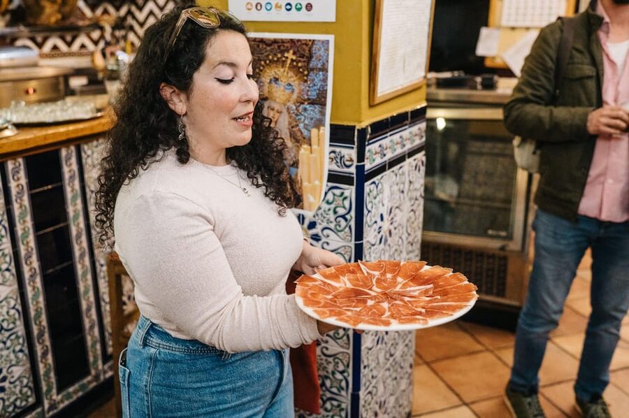 Seville: Private Tapas & History Tour in Triana Neighborhood - Price and value for a $411-per-person private crawl