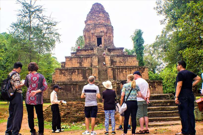 Siem Reap: Banteay Srei and Grand Circuit Heritage Tour - Preah Khan: tree roots, crumbling stone, and World Monument Fund restoration