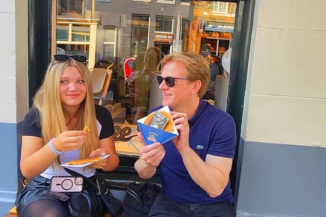 Skipping Lines & Sipping Beers: A History Tour of Amsterdam - Canal-Side Streets and History Stories That Make the City Click
