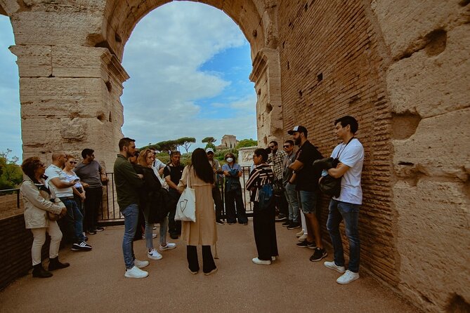 Small group Colosseum with Arena Floor, Palatine Hill & Forum Tour - Listening with headphones: small detail, big comfort