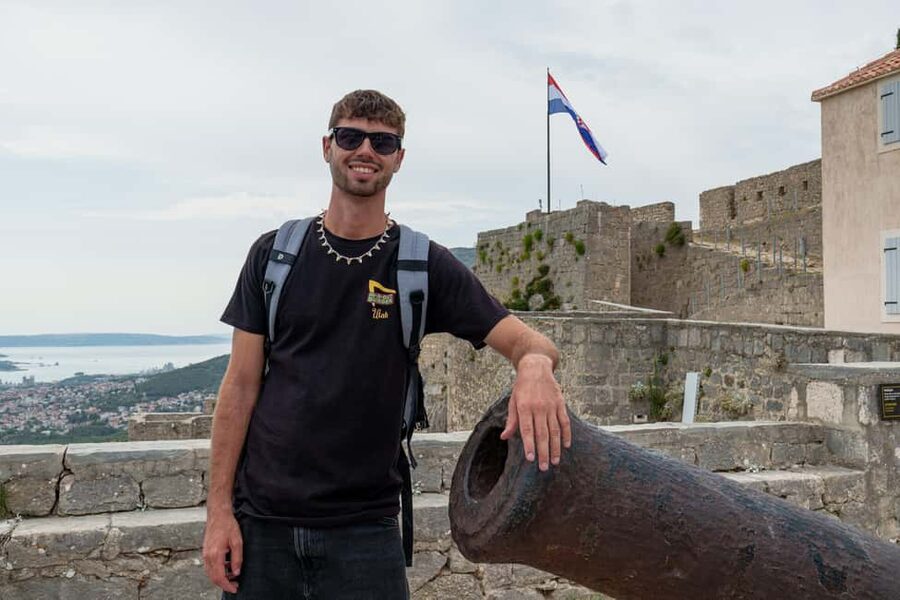 Split: Historical Tour of Salona, Klis Fortress and Trogir - Meeting at Apodos Travel Agency and riding an open-top red bus