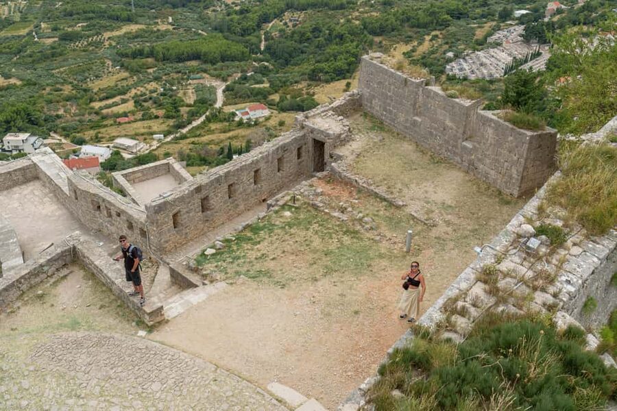 Split: Historical Tour of Salona, Klis Fortress and Trogir - Klis Fortress: steep steps, huge views, and a best-photo moment