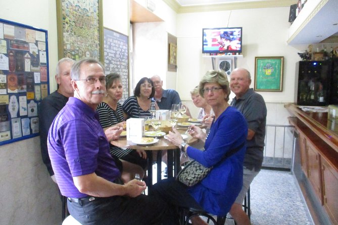 Tapas and history tour ending with churros with chocolate - Puerta del Sol stop: the city’s symbolism, explained between bites